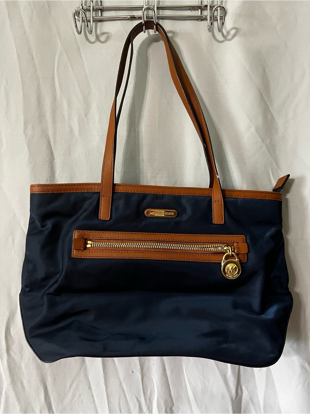 Michael Kors Navy Tote with Brown Trim and Gold Accent